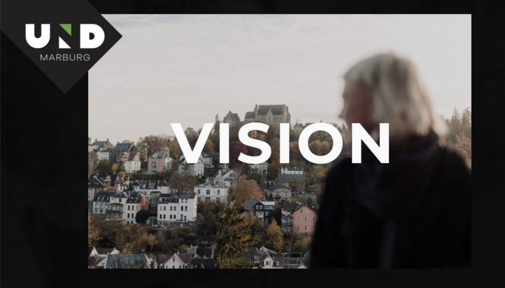 Unschärfer Blick auf Stadtlandschaft mit Vision Text